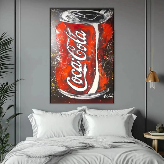 Tableau pop art avec canette rouge vif, touches blanches et noires, ambiance ludique pour salon moderne ou cuisine.