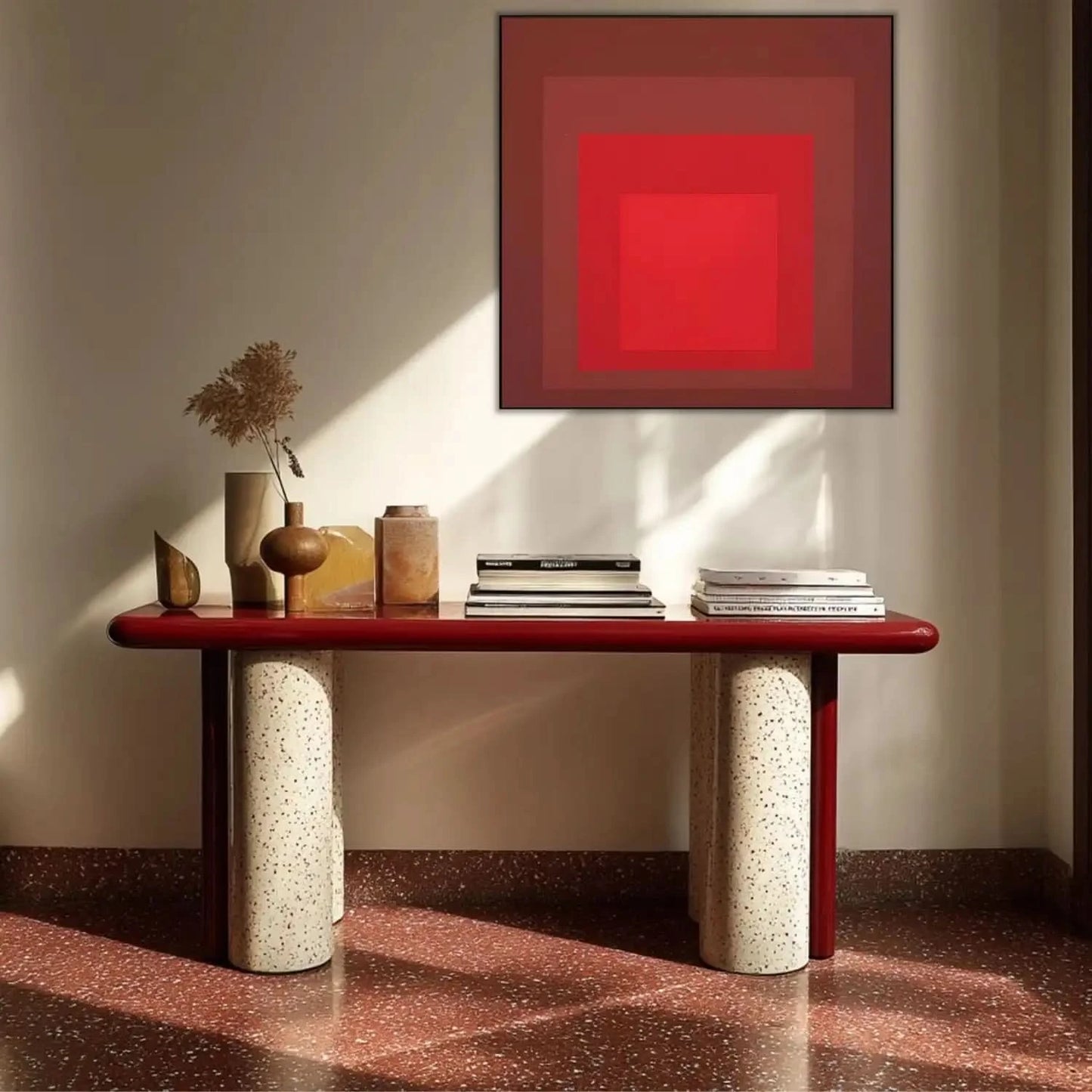 Tableau minimaliste avec carrés rouges imbriqués, rouge intense, ambiance captivante pour salon moderne ou bureau.