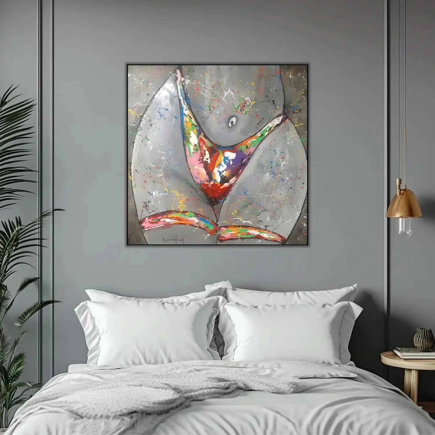 Silhouette féminine stylisée avec éclaboussures multicolores sur fond gris, énergie vibrante pour salon moderne.