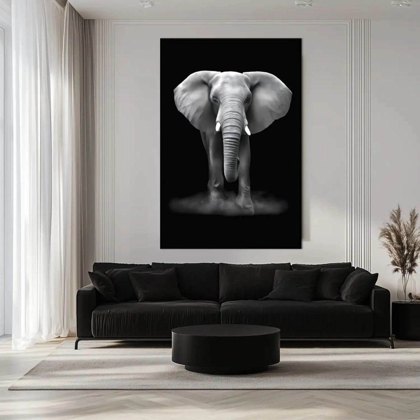 Tableau minimaliste noir et blanc montrant un éléphant de face sur fond sombre, évocateur de force et de sérénité.