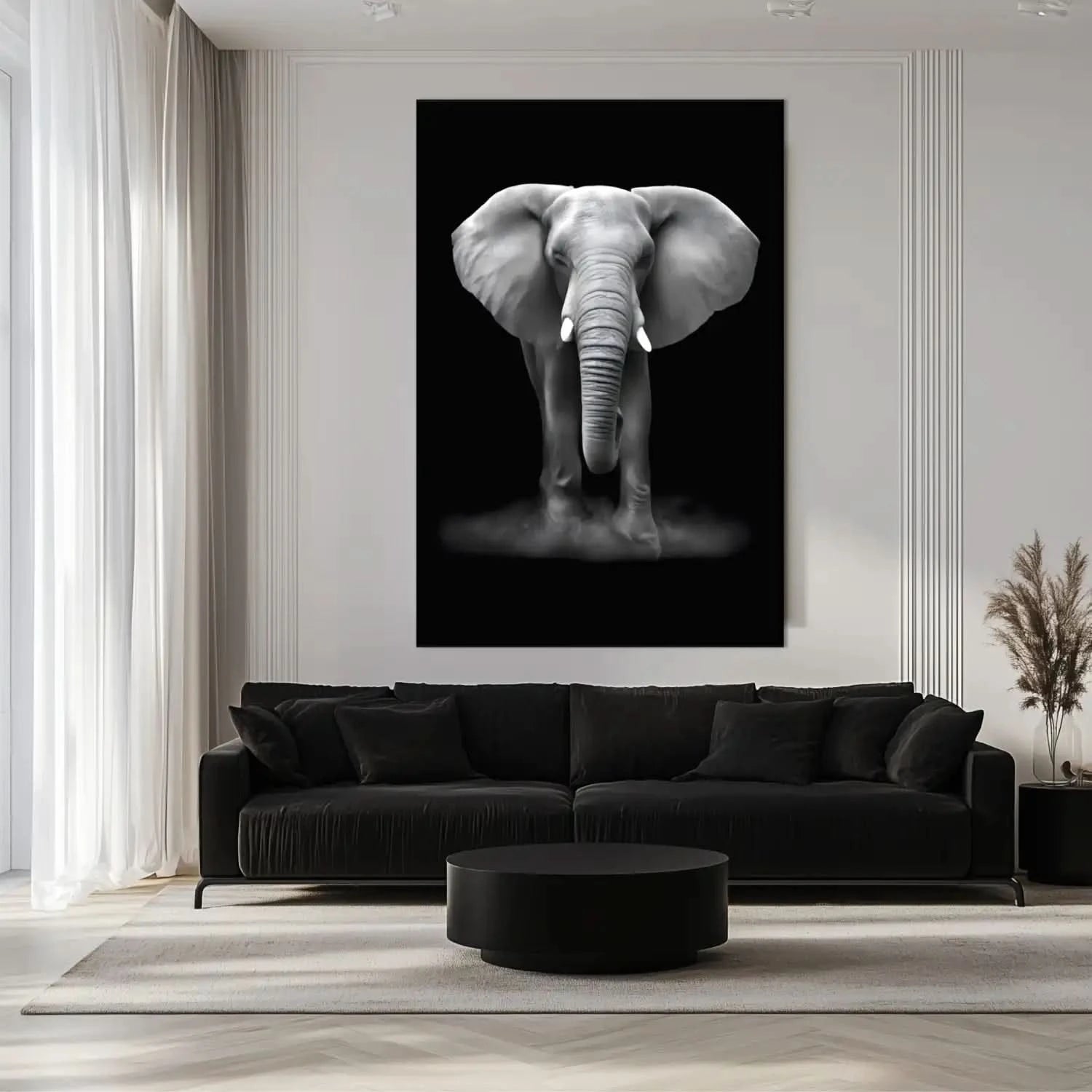 Tableau minimaliste noir et blanc montrant un éléphant de face sur fond sombre, évocateur de force et de sérénité.