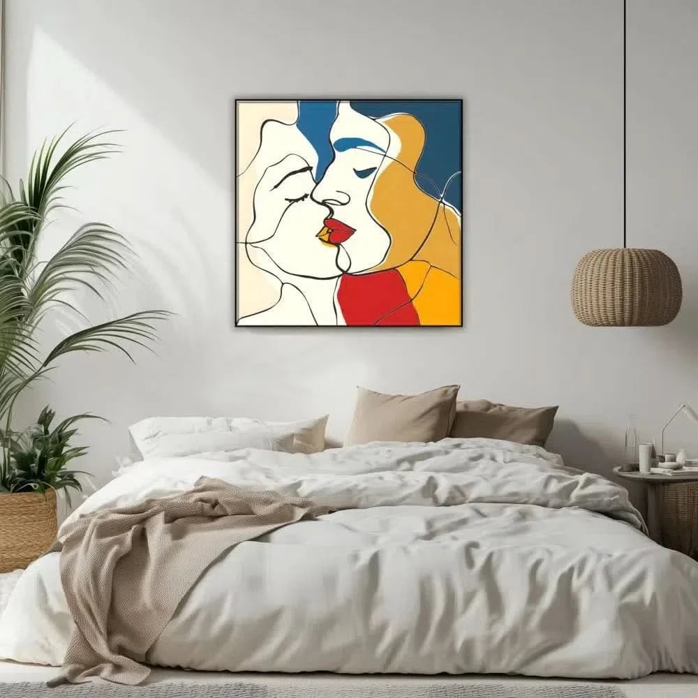 Tableau abstrait représentant deux visages, avec des lignes nettes et des couleurs vibrantes de rouge, jaune et bleu.