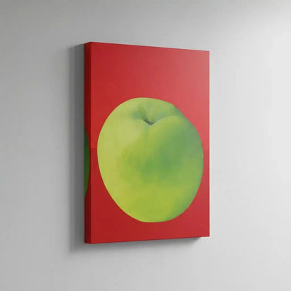 Tableau moderne avec une pomme verte vibrante sur fond rouge profond, style minimaliste, idéal pour cuisine ou salon contempo
