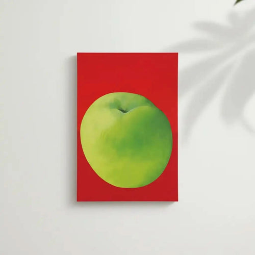 Tableau moderne avec une pomme verte vibrante sur fond rouge profond, style minimaliste, idéal pour cuisine ou salon contempo