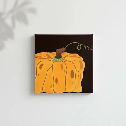 Peinture de courge orange vif sur fond noir, ambiance chaleureuse et rustique, idéale pour salon ou cuisine.