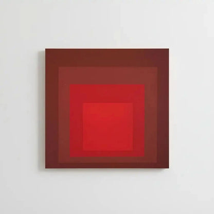 Tableau minimaliste avec carrés rouges imbriqués, rouge intense, ambiance captivante pour salon moderne ou bureau.