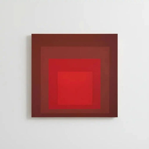 Tableau minimaliste avec carrés rouges imbriqués, rouge intense, ambiance captivante pour salon moderne ou bureau.