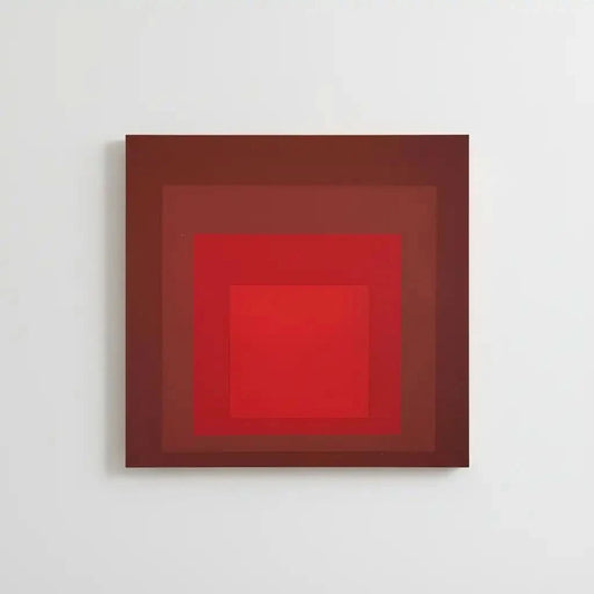 Tableau minimaliste avec carrés rouges imbriqués, rouge intense, ambiance captivante pour salon moderne ou bureau.