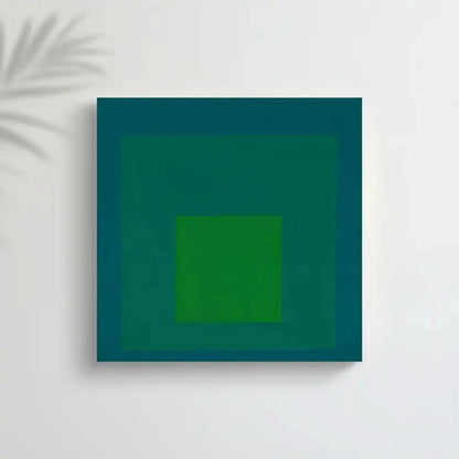 Tableau minimaliste avec carrés concentriques en vert émeraude et bleu profond, ambiance calme et équilibrée pour bureau mode