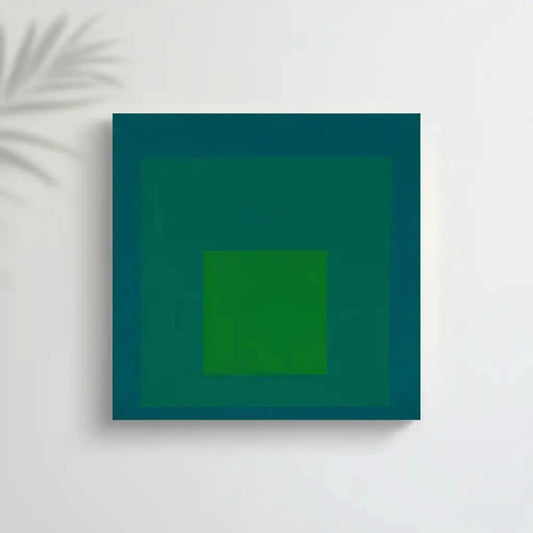 Tableau minimaliste avec carrés concentriques en vert émeraude et bleu profond, ambiance calme et équilibrée pour bureau mode