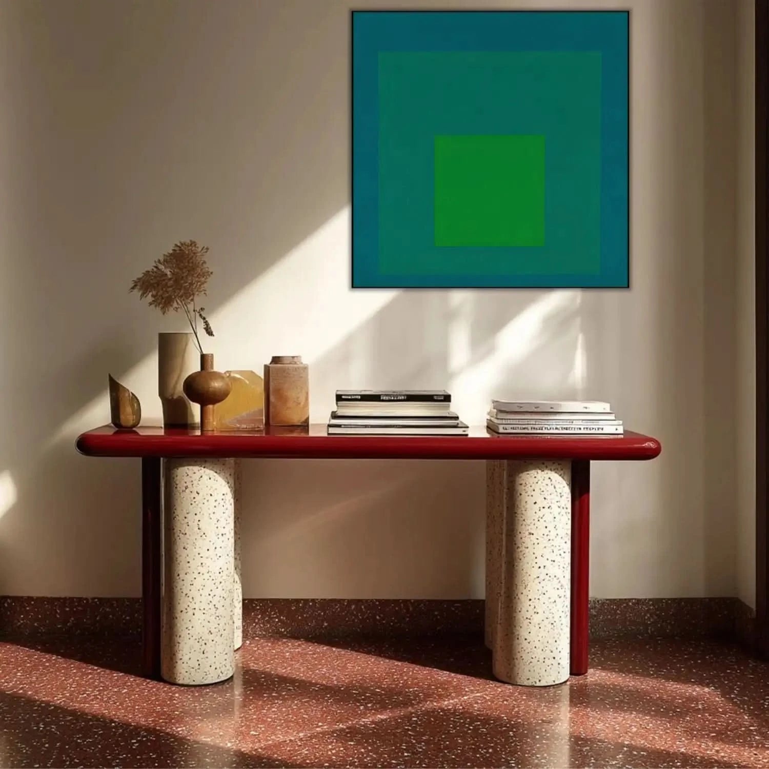 Tableau minimaliste avec carrés concentriques en vert émeraude et bleu profond, ambiance calme et équilibrée pour bureau mode