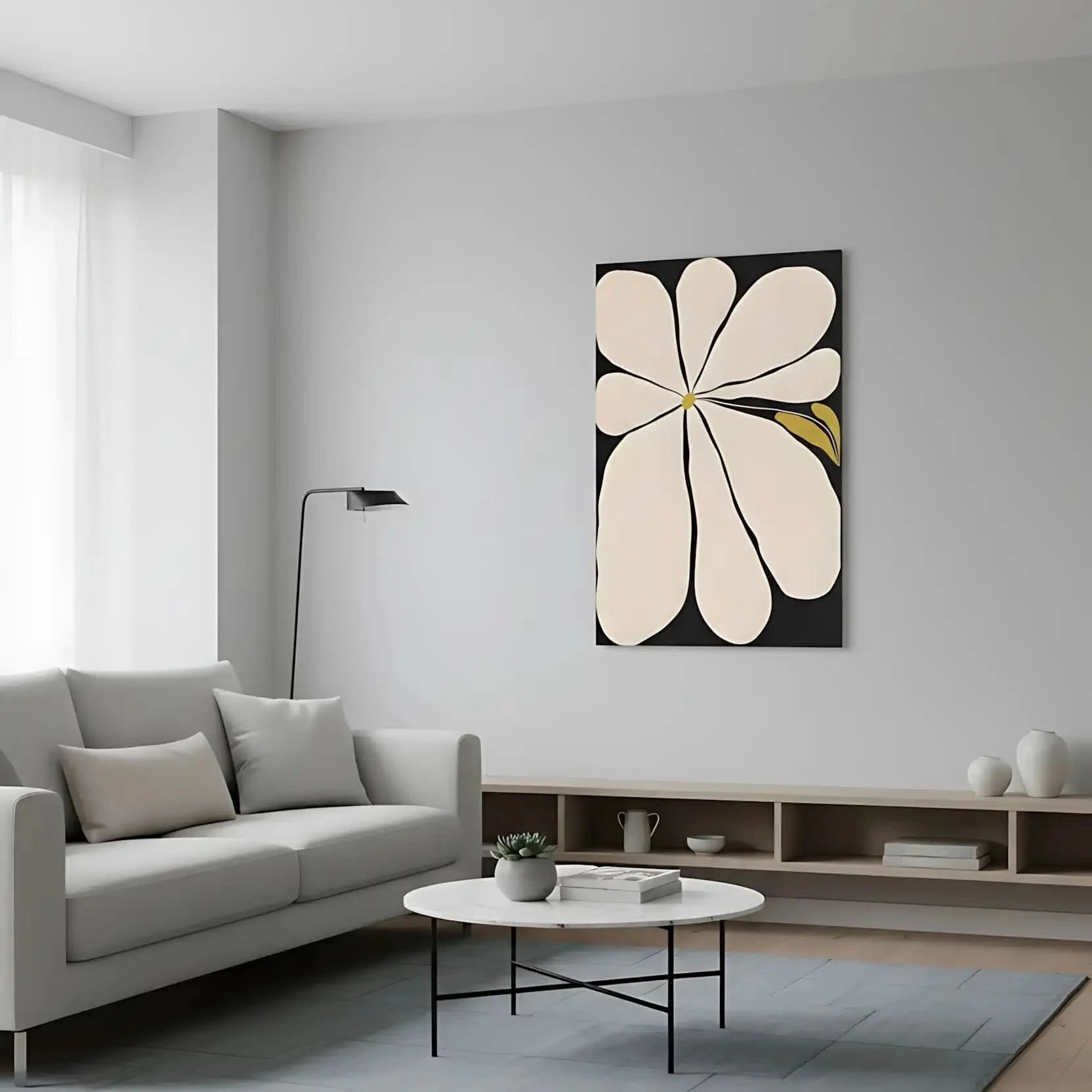 Tableau minimaliste avec fleur blanche sur fond noir, touches de jaune, ambiance sereine pour salon ou chambre moderne.