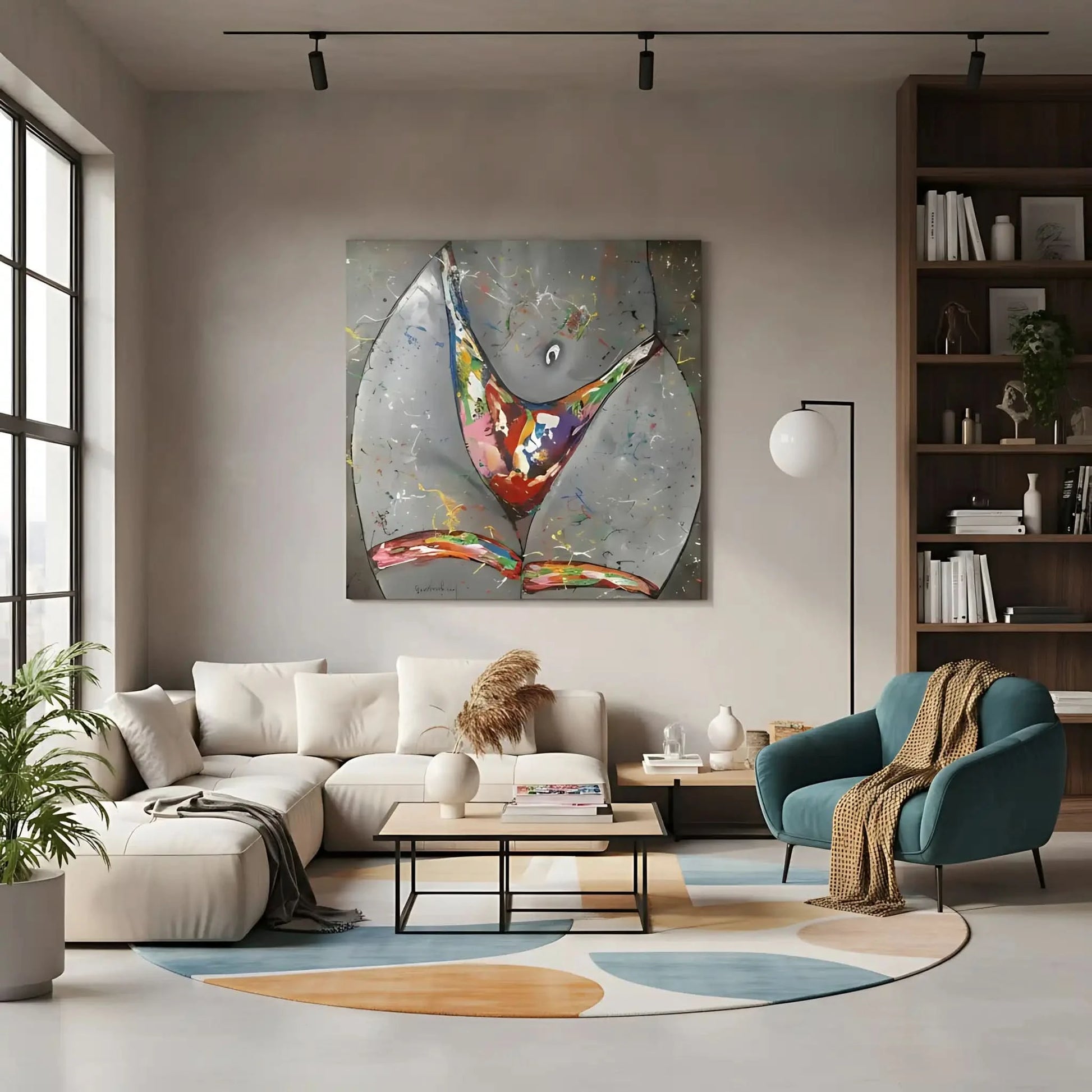 Silhouette féminine stylisée avec éclaboussures multicolores sur fond gris, énergie vibrante pour salon moderne.