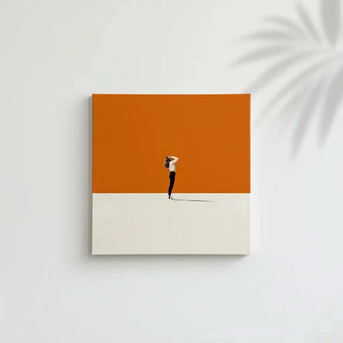 Silhouette solitaire dans un paysage minimaliste avec un fond orange, créant une ambiance calme et méditative.