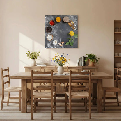 Nature morte minimaliste avec épices rouges et jaunes, grains de café, ail et citron; composition épurée.