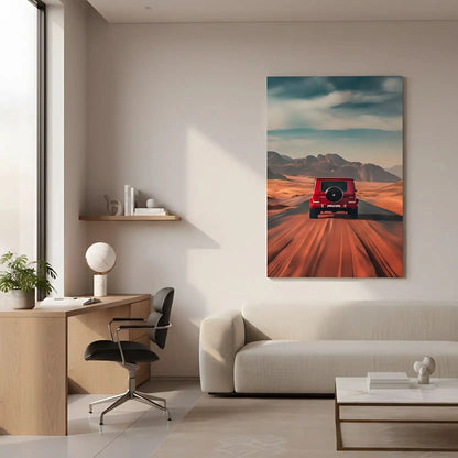 Photographie d'un voiture rouge roulant sur une route désertique, avec un paysage de montagnes lointaines, créant une ambiance d'aventure.