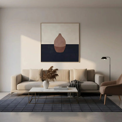 Tableau minimaliste avec vase en terre cuite sur fond contrasté. Élégant et apaisant, idéal pour un salon moderne.