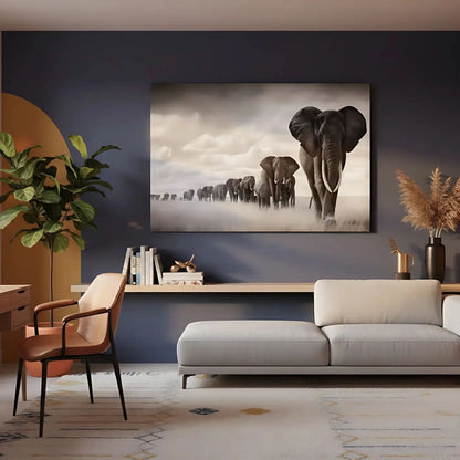 Tableau noir et blanc d'une file d'éléphants avançant dans la savane sous un ciel nuageux, symbole de force et d'unité.