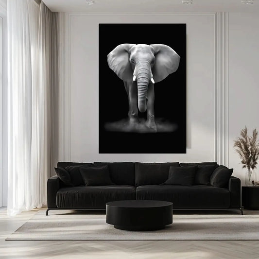 Tableau minimaliste noir et blanc montrant un éléphant de face sur fond sombre, évocateur de force et de sérénité.
