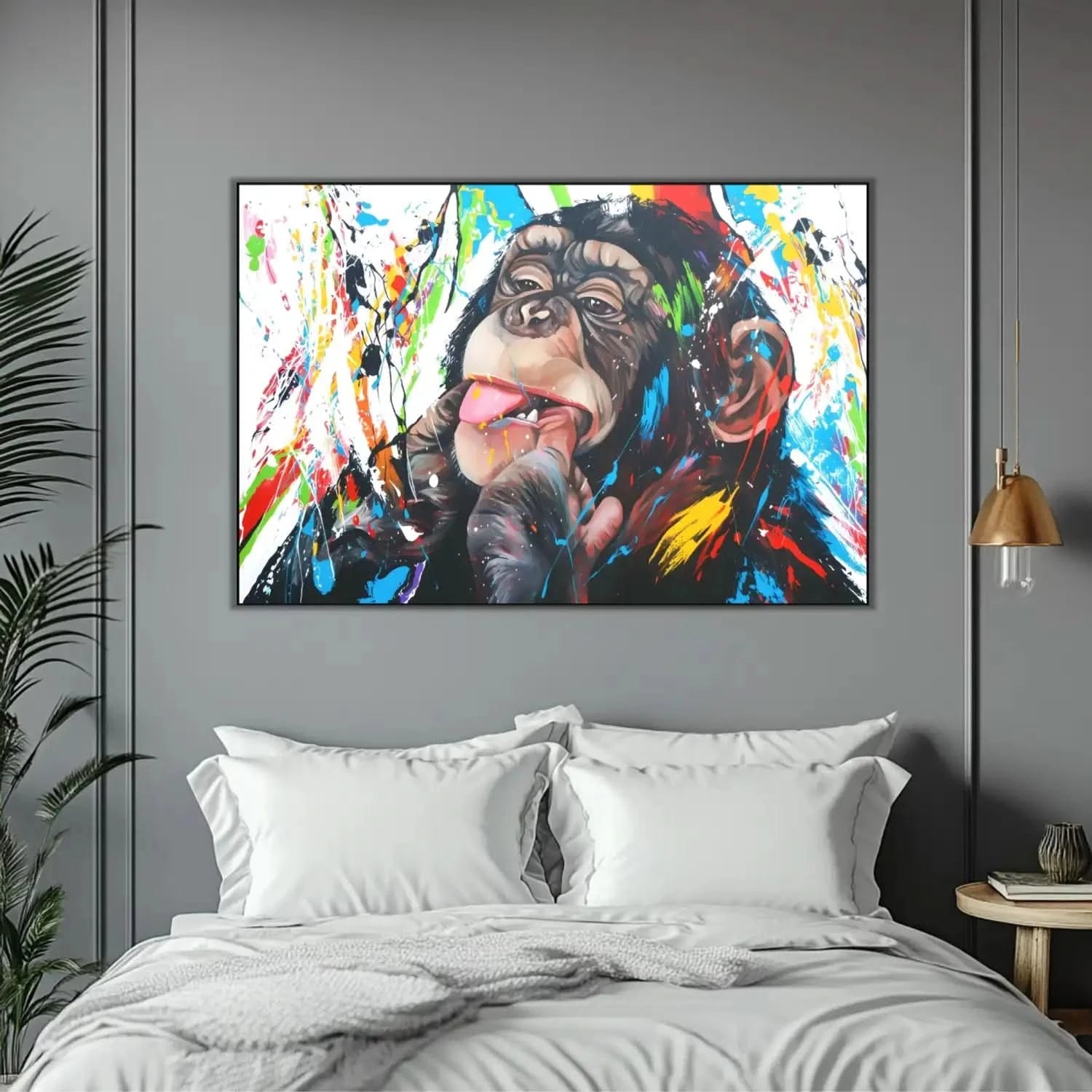 Toile Pop Art avec singe espiègle, éclaboussures multicolores, ambiance joyeuse pour salon moderne ou chambre d'enfant.