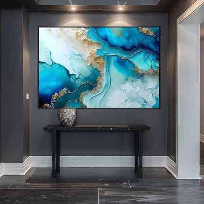 Tableau abstrait avec bleus profonds et dorés lumineux, ambiance sereine et élégante pour salon ou bureau moderne.